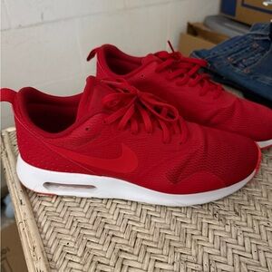 Red and white Nikes 10.5